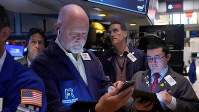 Traders on the floor of the New York Stock Exchange. Gold surged past $2,500 on Friday, driven by optimism for a Fed rate cut and strong economic data. AP