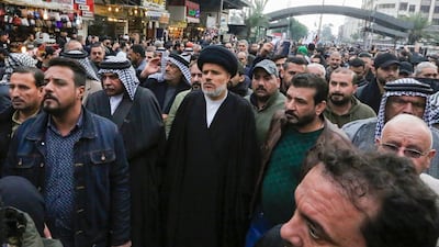 Mohammed al-Tabatabai (centre), deputy secretary general of the Asaib Ahl Al Haq faction, attends the funeral of Iraqi paramilitary chief Abu Mahdi Al Muhandis and Iranian military commander Qassem Suleimani, in Kadhimiya, a Shiite pilgrimage district of Baghdad. AFP