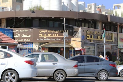 The signs at a Yemeni restaurant and cafe in Amman reads: "Happy Yemen gate restaurant, happy Yemen gate cafeteria and Old Sanaa restaurant". The National