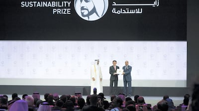 Sheikh Mohamed bin Zayed, Crown Prince of Abu Dhabi and Deputy Supreme Commander of the UAE Armed Forces and Mohamed Aziz, President of Mauritania, present an award to a winner of the Zayed Sustainability Prize in January. Hamed Al Mansoori / Ministry of Presidential Affairs