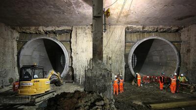 Workers prepare the rail tunnels at the new Crossrail station at Paddington. Peter Macdiarmid / Getty Images