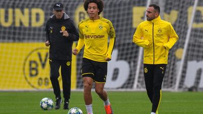 Borussia Dortmund's Swiss coach Lucien Favre oversees a training session of his players on the eve of the Champions League Group F match against Barcelona in Dortmund, western Germany. AFP