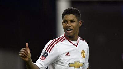 Marcus Rashford celebrates after scoring for Manchester United against West Ham in the FA Cup on Wednesday night. Toby Melville / Reuters / April 13, 2016