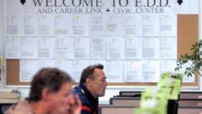 People use computers to look for work at the California employment development department in San Francisco, California. US employers cut 216,000 jobs in August, fewer than in previous months but the unemployment rate rose to a 26-year high of 9.7 per cent.