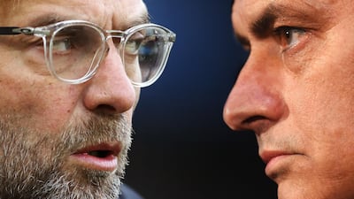 Liverpool's Jurgen Klopp, left, are in a different fame ot mind to Manchester United's Jose Mourinho. Getty Images