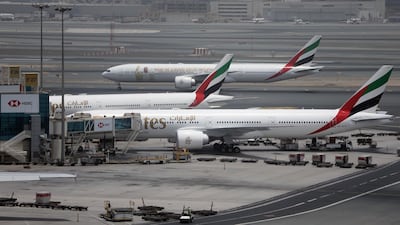 Emirates airline planesat the Dubai International Airport. The region's aviation sector is bouncing back. Kamran Jebreili/AP