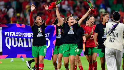Morocco's players celebrate after defeating South Africa in the Women's Africa Cup of Nations quarter-final in Rabat to qualify for the 2027 World Cup. EPA