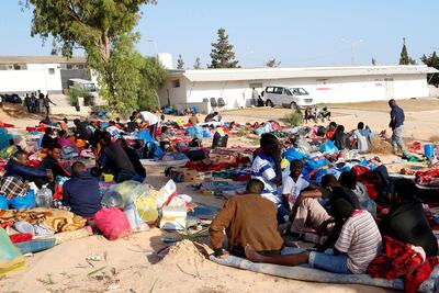 Migrants gather outside the detention centre in Tajoura, a suburb of Tripoli, Libya, on July 7, 2019, four days after it was hit by an air strike. Reuters