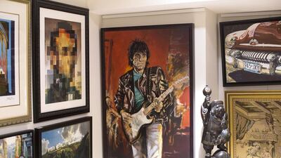 Above, a self-portrait of Keith Richards of Rolling Stones, centre, at the Ocean View Antiques and Antiquities. Clint McLean for The National
