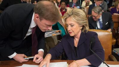 Former Secretary of State and Democratic presidential candidate Hillary Clinton (R) speaks with former Clinton staff member at the State Department, Jake Sullivan (L), during a break from testifying at the House Select Committee on Benghazi, on Capitol Hill in Washington DC, USA, 22 October 2015. EPA