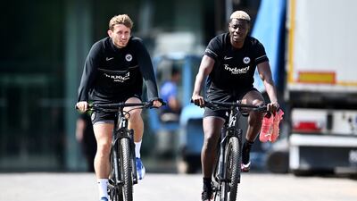 Christopher Lenz and Ragnar Ache of Eintracht Frankfurt arrive for training. Getty