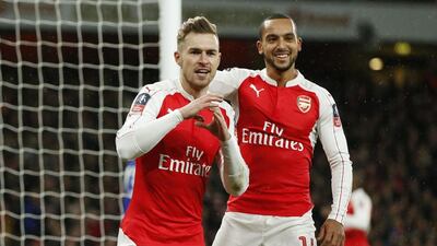 Aaron Ramsey, left, can be a big player for Arsenal this season, assuming he avoids injury and is played in a central midfield role. John Sibley / Reuters
