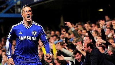 Chelsea's Spanish striker Fernando Torres celebrates scoring the winning goal of the English Premier League football match between Chelsea and Manchester City at Stamford Bridge in west London on October 27, 2013. Chelsea won the game 2-1. AFP PHOTO/GLYN KIRK