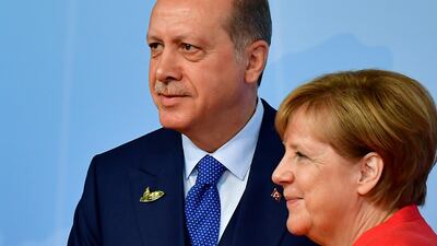 Mrs Merkel with Turkish president Recip Tayyip Erdogan. Tobias Schwarz / AFP Photo