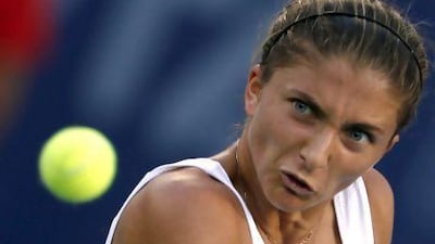 Italy's Sara Errani returns the ball to her compatriot Roberta Vinci during their semi-final tennis match at the Dubai Duty Free Championships on Friday. Karim Sahib / AFP