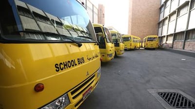 School buses have been painted yellow to comply with Adec/DOT regulations. Fatima Al Marzooqi/ The National