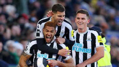 LEICESTER, ENGLAND - DECEMBER 26: Joelinton of Newcastle United celebrates with teammates after scoring the team's third goal during the Premier League match between Leicester City and Newcastle United at The King Power Stadium on December 26, 2022 in Leicester, England. (Photo by Marc Atkins / Getty Images)