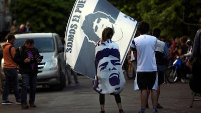 Fans of Diego Maradona show their support as Maradona is transferred from La Plata to Buenos Aires for his operation. EPA