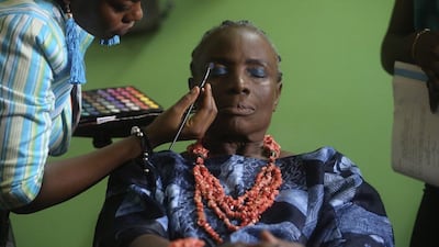 Nigerian actress Taiwo Ajayi-Lycette gets make-up applied on her before filming a scene for ‘Dazzling Mirage’, directed by Tunde Kelani, on the outskirts of Lagos.