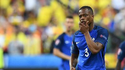 France’s defender Patrice Evra reacts during the Euro 2016 group A football match between France and Romania at Stade de France, in Saint-Denis, north of Paris, on June 10, 2016. Franck Fife / AFP