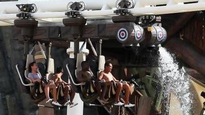 ABU DHABI , UNITED ARAB EMIRATES - Jan 16 : Staff members of the Yas Waterworld giving demo at the Ô Bandit Bomber roller coaster ´ for media at the Yas Waterworld in Abu Dhabi. ( Pawan Singh / The National ) For News. Story by Emily Cleland
