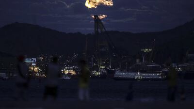 A view of the super moon in Rio de Janeiro, Brazil. Antonio Lacerda / EPA.