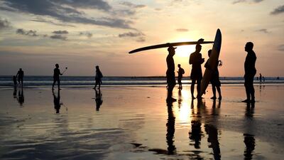 Faced with growing hostility in the US, Iranian Kurd-American teenager Rez goes on a surfing trip to Bali, where his faith awakens, with far-reaching consequences, in A Good Country. Sonny Tumbelaka / AFP