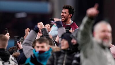 Trezeguet celebrates after the match with Aston Villa fans. Reuters