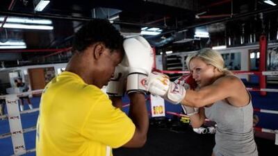 :Lise Knudsen, whose fighting name is the Killer Bunny, trains with Hassan Okine at the KO Gym in Dubai.