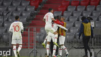 PSG players celebrate after Kylian Mbappe's second goal. PA