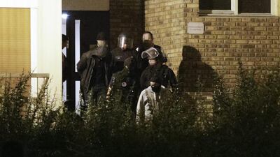 :A suspect linked to the plan to blow up a car near Notre Dame cathedral in Paris is taken from a flat in Boussy St Antoine. on September 9,2016. French police arrested three female suspects who they said were planning at least three attacks. Geoffroy van der Hasselt / AFP