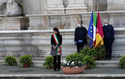 Mayor of Rome Virginia Raggi attends a memorial ceremony as mayors across Italy stand in silence to honour the country's dead due to coronavirus disease, in Rome, Italy, March 31, 2020. Reuters