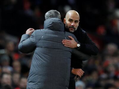 By the looks of it Jose Mourinho, left, is being outdone by rival Pep Guardiola of Manchester City. Darren Staples / Reuters
