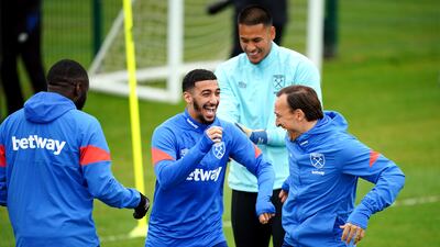 Mark Noble and Said Benrahma enjoy the training session. PA