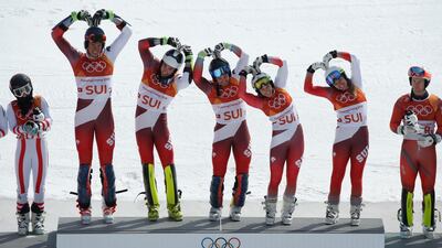 Switzerland's alpine skiing team celebrate during the victory ceremony at the 2018 Winter Olympics. Mike Segar / Reuters