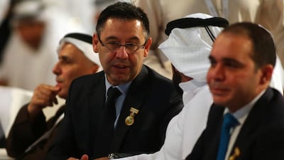 Barcelona President Josep Maria Bartomeu, left, attends the opening session of the Dubai International Sports Conference. Marwan Naamani / AFP