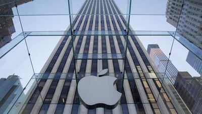 The Apple logo at its 5th Avenue location in New York. Demand for the iPhone 6 and 6 Plus is putting Apple on pace for its highest annual profit since 2012. John Taggart / EPA