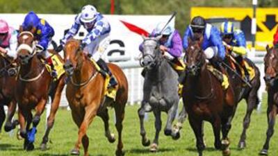 The Sheikh Hamdan owned Finjaan, ridden by Tadhg O'Shea, right, overshadowed the much hyped JJ The Jet Plane, by making a late charge to win the Betfair Cup (Lennox Stakes) during the Glorious Goodwood Festival at Goodwood racecourse, England, yesterday.