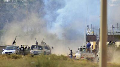 Smoke rises during clashes between forces loyal to former army general Khalifa Haftar and Islamist militants in the eastern city of Benghazi on June 2, 2014. Reuters