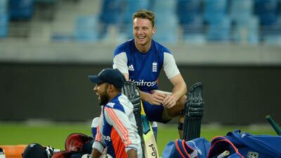 Jos Buttler waits to bat alongside Adil Rashid during a nets session. Gareth Copley / Getty Images