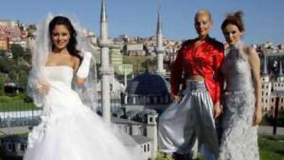 Models present creations by Turkish designers during a fashion show in Istanbul.