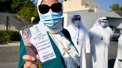 Khadija Al Qallaf arrives in Kuwait City to file candidacy papers for the parliamentary elections. EPA