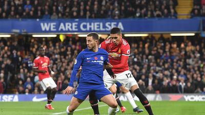 Chelsea's Eden Hazard, in blue, in action against Manchester United defender Chris Smalling during Chelsea's 1-0 Premier League win. Facundo Arrizabalaga / EPA