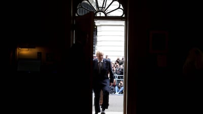 Prime Minister Boris Johnson walks into No 10 after resigning as the leader of the Conservative Party. All photos: Andrew Parsons / No 10 Downing Street