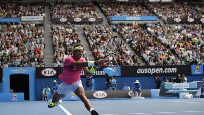 Rafael Nadal lunges to return a shot during his Australian Open quarter-final match against Tomas Berdych on Tuesday. Bernat Armangue / AP