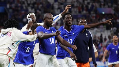 Jean-Philippe Mateta and his France teammates celebrate victory over Egypt in the Olympics semi-finals. Reuters