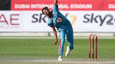 Dubai's Nilansh Keswani bowls in the game between Dubai and Fujairah in the Emirates D20. Monday, December 7th, 2020 in Dubai. Chris Whiteoak / The National