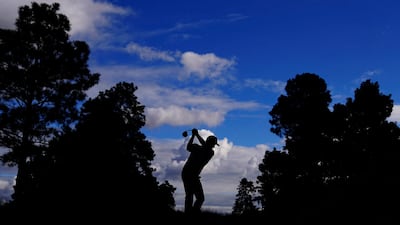 Webb Simpson tees-off on the ninth hole on his way to a 67. AP