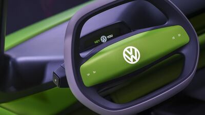 A logo is displayed on the steering wheel. Chris J Ratcliffe / Bloomberg