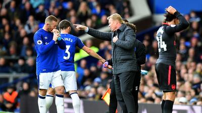 Ronald Koeman, right, brought Wayne Rooney, left back to Everton in the summer as part of a £140 million summer outlay on players. Following Sunday's 5-2 defeat at home to Arsenal, a result that left the club in the relegation zone, the Dutchman was dismissed as the club's manager. Tony Marshall / Getty Images